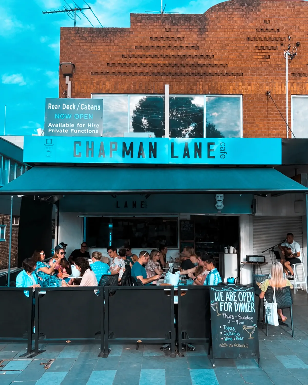 A busy morning at the tables out the front of Chapman Lane